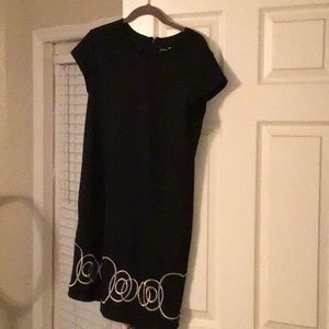 Black dress embroidered.